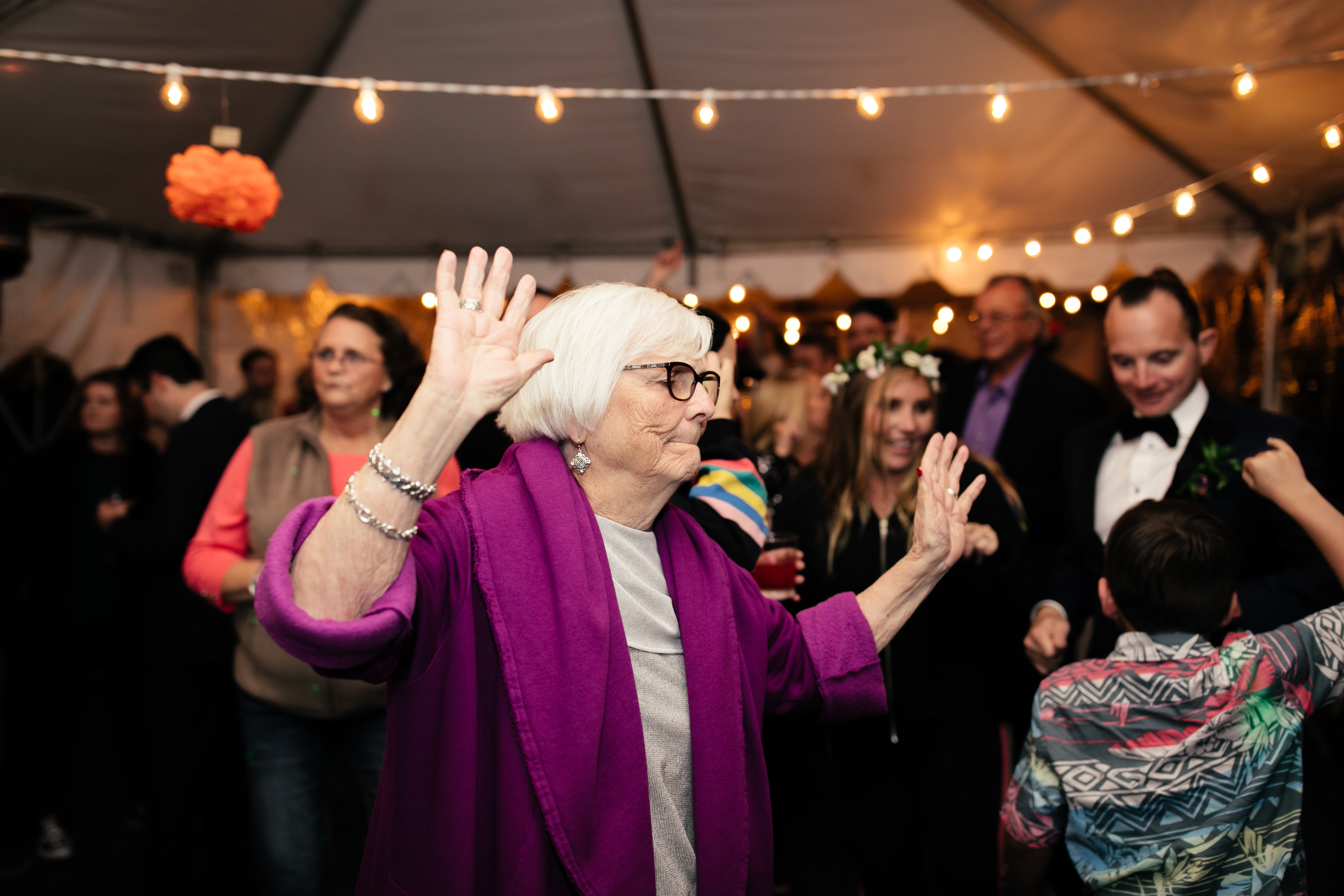 grandma dancing at wedding at sunset cliffs wedding