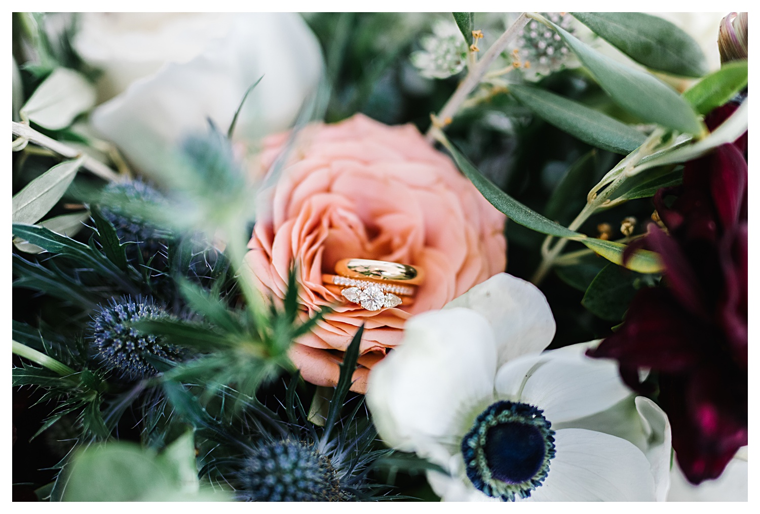 photo of wedding rings in florals