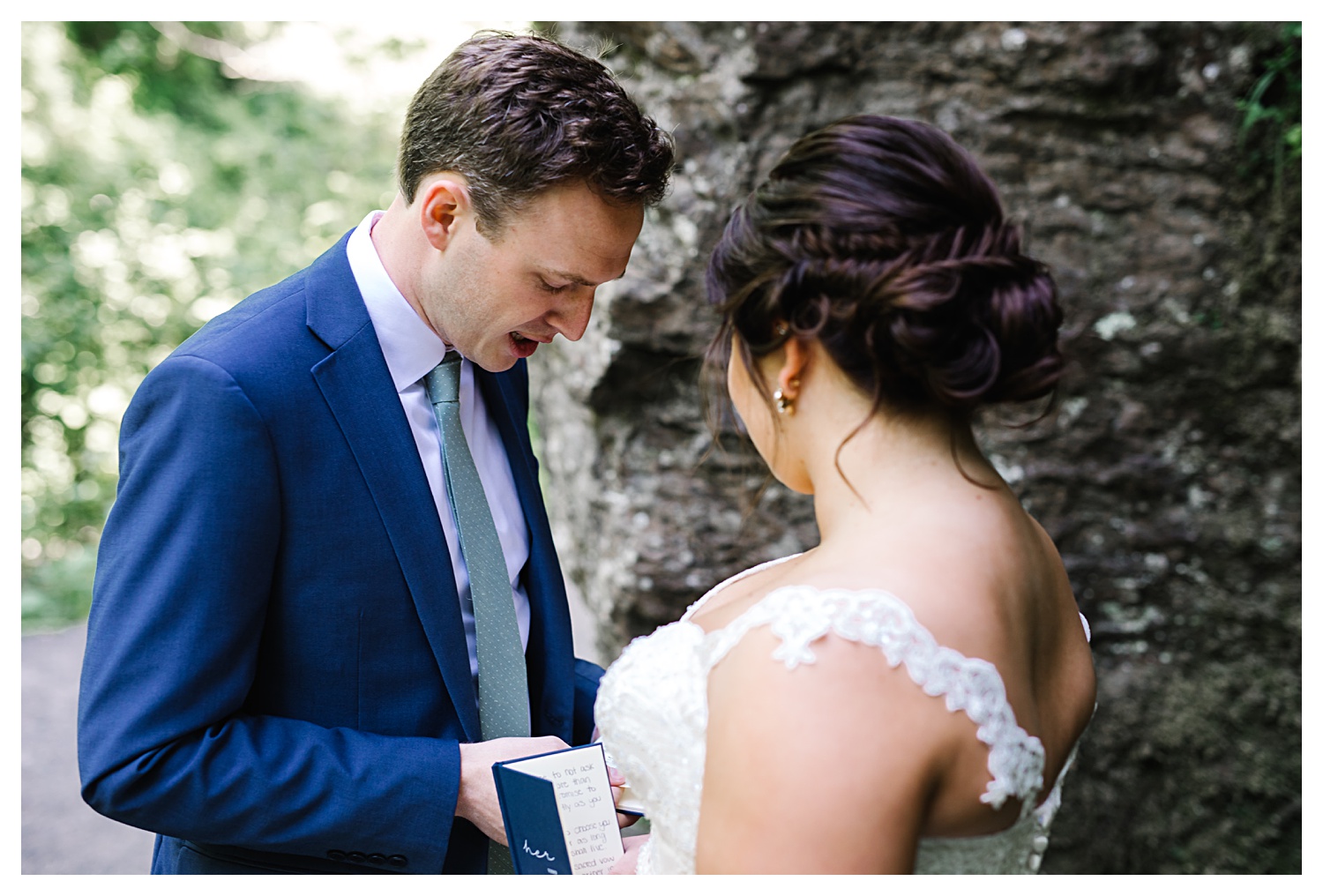 groom reading vows to bride