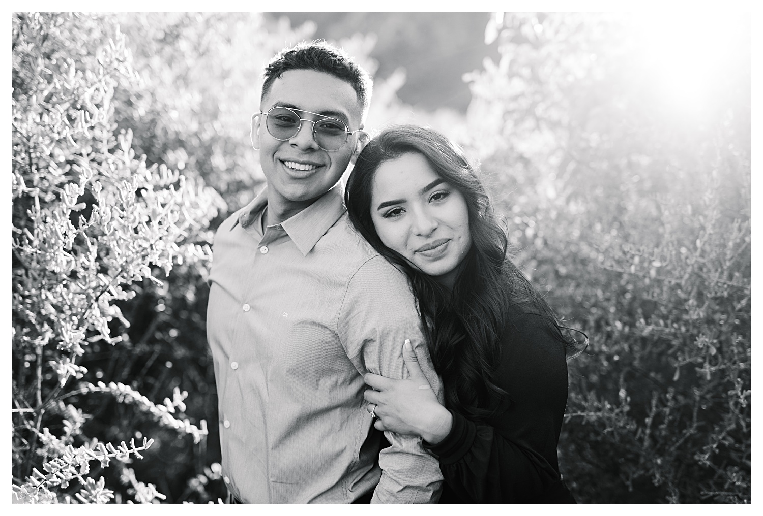 Angeles National Forest Engagement Photos engaged couple with sun flare in black and white