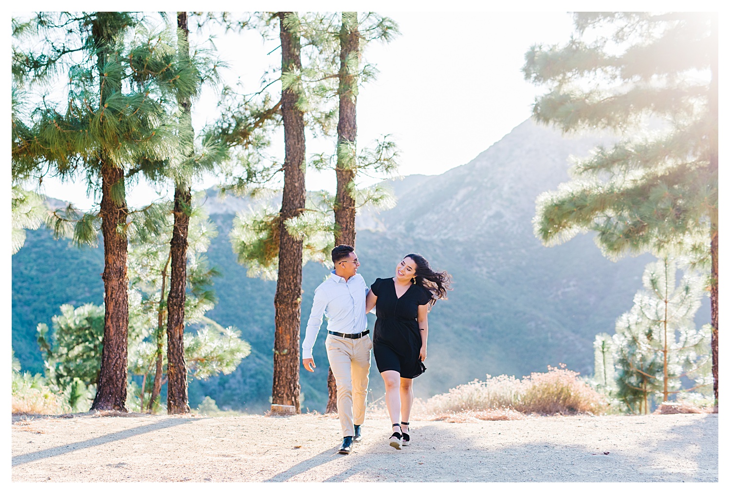 Angeles National Forest Engagement Photos couple with arm around each other walking